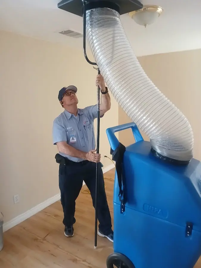 Mini Split Installation technician using HEPA equipment in Mound
